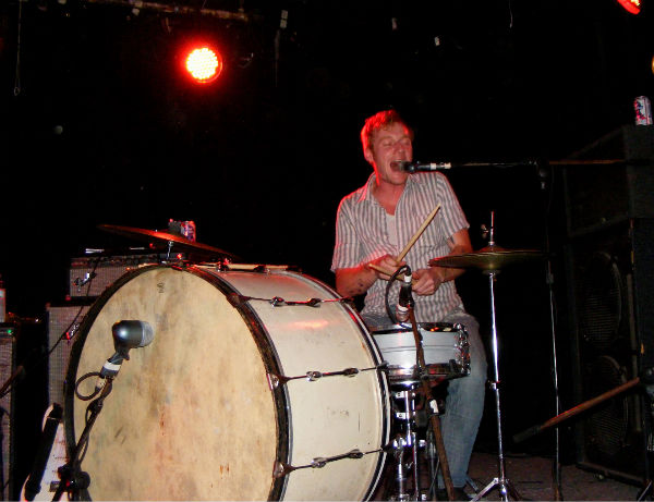 Guitarist / vocalist / drummer Curtis O\'Mara behind an enormous bass drum.