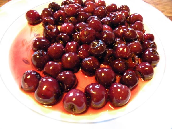 Allowing the cherries to cool.
