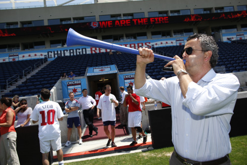 Fire Technical Director Frank Klopas sounds the vuvuzela