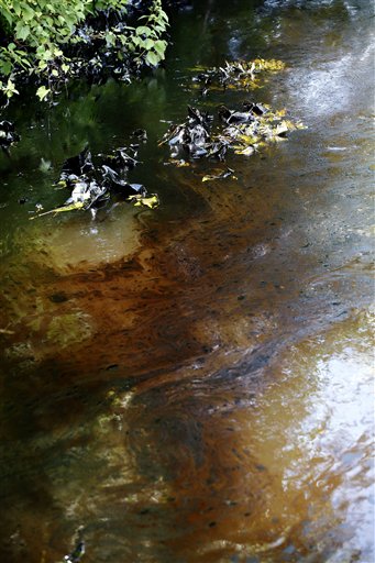 Oil floats in the Kalamazoo River