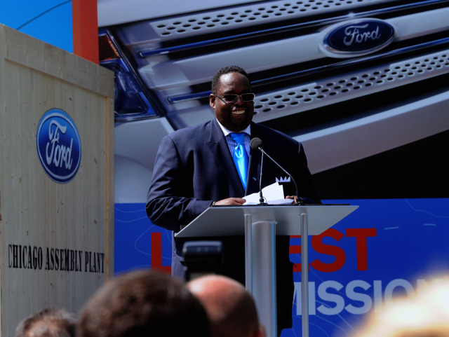 UAW Local 551 Vice President James Settles Jr. speaks to the crowd of car fanatics and autoworkers at the unveiling.