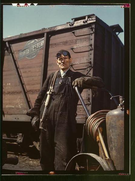 Mike Evans, a welder, at the rip tracks at Proviso yard of the C & NW RR, Chicago, Ill., 1943 April