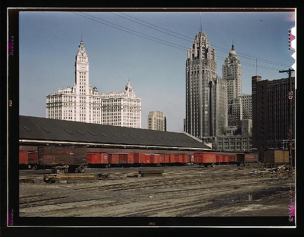 Trucks unloading at the inbound freight house of the Illinois Central Railroad, South Water Street freight terminal, Chicago, Ill., 1943 April