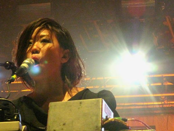 Nancy Whang kicks in some vocals