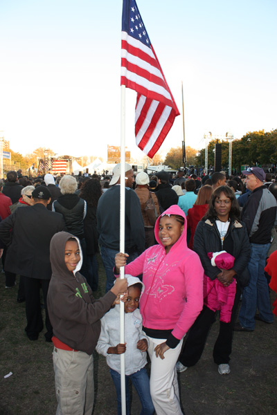 Flag waivers came in all shapes and sizes for the Obama Rally on the Midway Saturday.