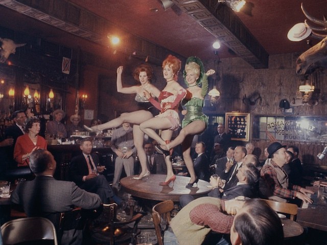 I was shooting the Gaslight Club at New Year\'s time 1963 for \<em\>Holiday\<\/em\> magazine. Near the entrance to one of the rear rooms was a naughty statue of a naked lady that had graced the infamous brothel run by the famous Everleigh sister madams. My editor was so taken with the statue I almost forgot to shoot the real live girls brightening the 1963 New Year\'s Eve. I learned just the other day that the house in Deerfield that once belonged to a physician I knew- had been used as a sub rosa rest home for tired Everleigh harlots. None of this excuses the lack of synchronicity of those long legs that kept the picture out of the magazine. It helps only if you realize those chorines are all over 70 now.