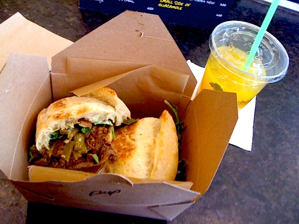 The delicious pepito torta comes stacked with braised beef.