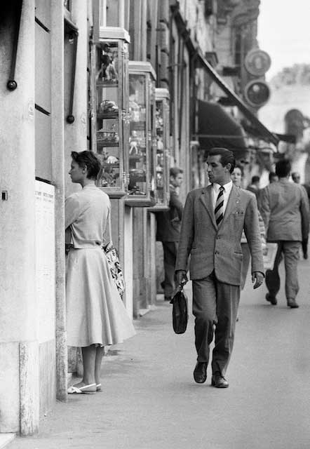 My movie writer associate, poet Dorothy Terry, went shopping in  Rome. Coming down the Spanish Steps I photographed her being ogled by 20 street types. As she looked in a dress shop window, another Italian looked at her. And why not?