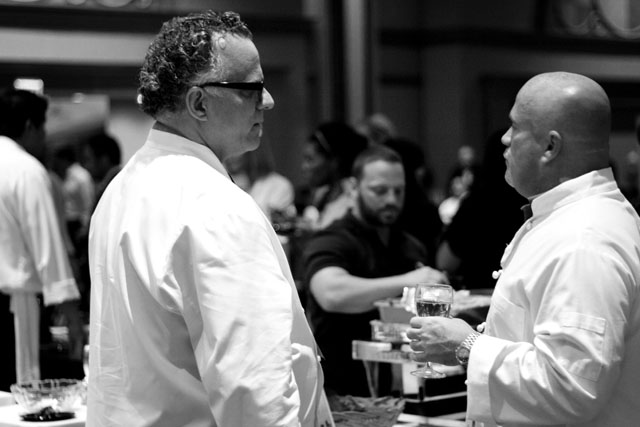 Chef Jimmy Bannos Sr. chats with a colleague. Both Heaven on Seven and the Purple Pig participated in the Great Chefs Tasting Party.