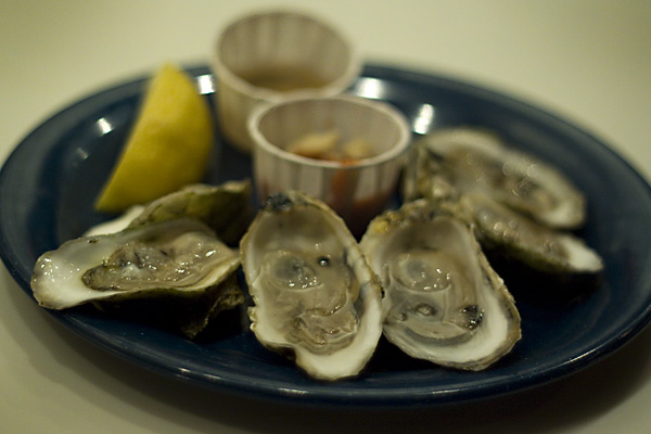 A half dozen Wellfleet oysters, served up at Lakeview\'s Fish Bar.