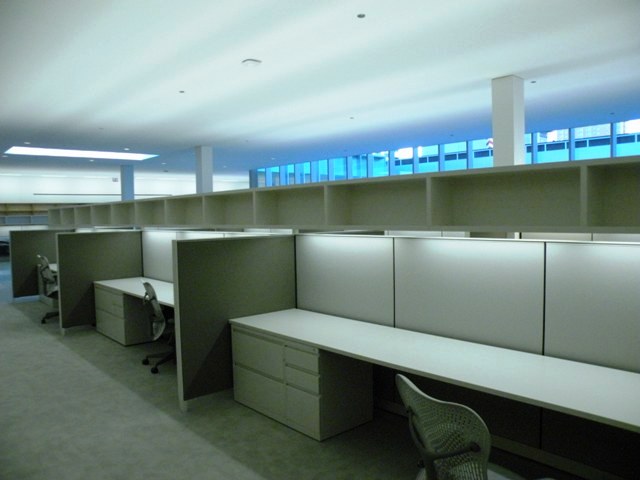 Ronan designed the offices to complement his \"spatial narrative.\" Here is a view of some of the cubicles in the Foundation\'s second-floor offices.