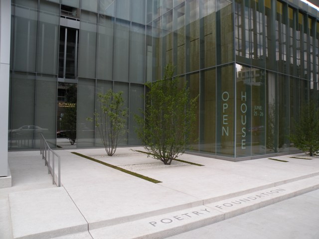 Entering the Poetry Foundation\'s garden, with a tribute to Foundation benefactor Ruth Lilly. The garden and screen mesh wall running down Superior are intended to give visitors a \"decompressing\" effect from the urban bustle.