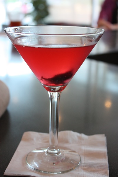 A \"Pretty Persuasion\" made with vodka and hibiscus.