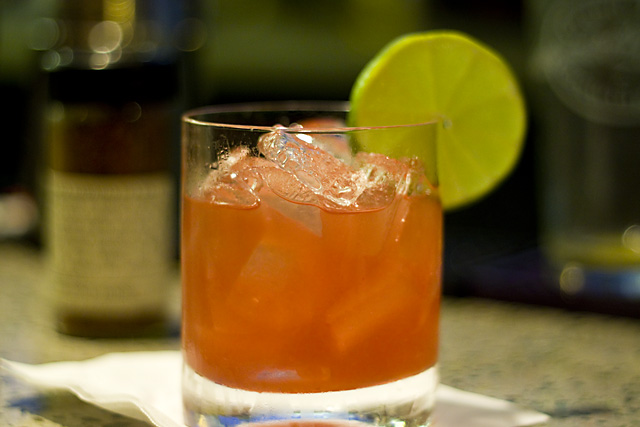 The Smoke and Mirrors Cocktail, a blend of Del Maguey Vida mezcal, HUM Liqueur, muddled limes, agave nectar and Red Alaea Hawaiian sea salt.