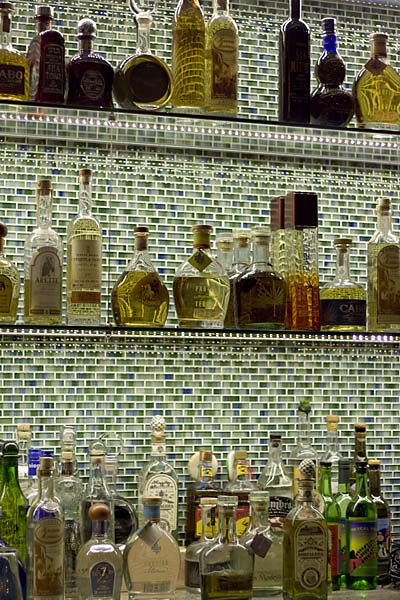 More than 70 different varieties of tequila and 10 mezcals line the shelves at Masa Azul\'s agave-centric bar.