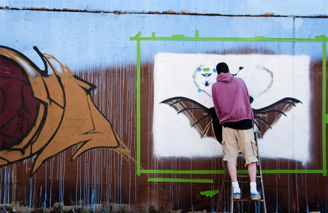 An artist from a Colorado crew works on his piece. (Annie Grossinger, for Chicagoist)