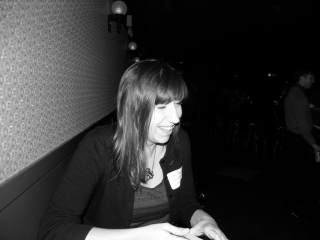 Associate Editor Samantha Abernethy laughing at my suggestion we misspell our names on the name tags. [Chuck Sudo/Chicagoist]