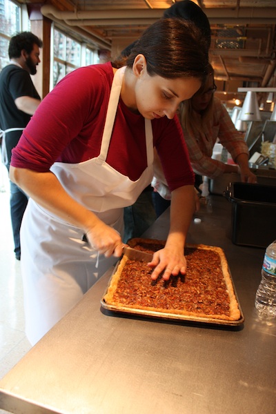 Christine chopping up the pecan maple bourbon tart.