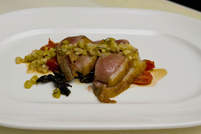 Sixth course, by Izard: Smoked duck breast with black kale and piparra-pineapple relish.