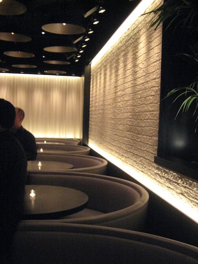 Circular booths line the outside of the main room when you walk in
