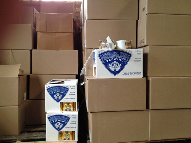 Cases of beer ready for labeling and shipping.