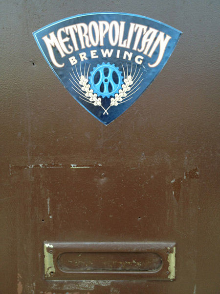 The modest door to Metropolitan Brewing.