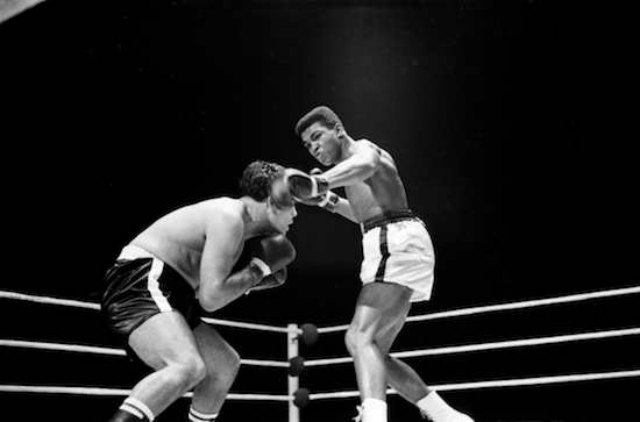 Muhammad Ali draws a bead on an accuser who called him \"too violent\" for words. \"People like this should be put away.\" Ali fought back and put him away. (Photo: Art Shay)