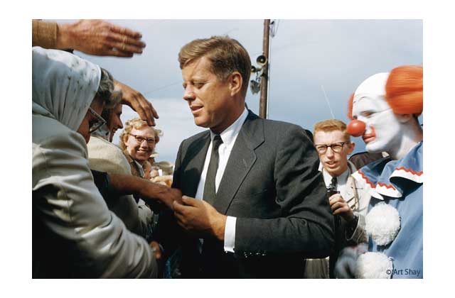 1960. JFK eschewing&mdash;or out-running&mdash;his security drones found himself surrounded by clownish types, any of whom could have terminated him without a book depository.