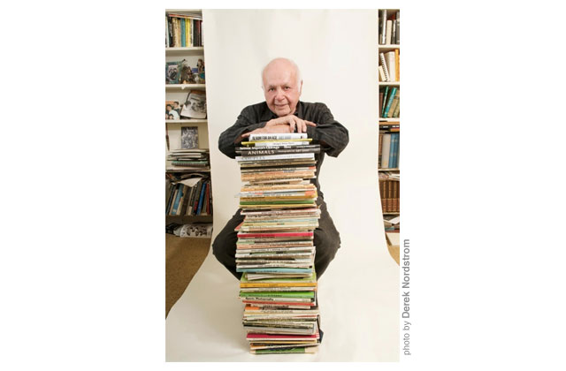 Apple instructional genius, Derek Nordstrom, who is also a gifted fotog,  shot me for a \<em\>North Shore Magazine\<\/em\> cover two years ago  with some of my 60 or so books. I must get around to reading some of them again.\r\n