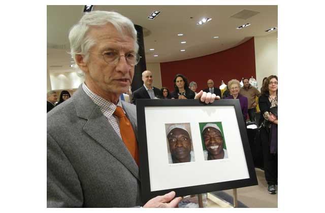 At the recent opening of his exhibition at the upscale Chicago Mark Shale clothing store on Michigan Avenue,a momentarily serious Dr. Michael Lewis displays two of his favorite images: A Ghana villager with eye-distorting cataracts and, 15 minutes after surgery, the same man gleeful in a Dr. Geoff Tabin field hospital reacting to  his first normal sight of his family since childhood. \"I had tears of joy in my eyes while taking the pictures,\" Lewis recalls. \r\n