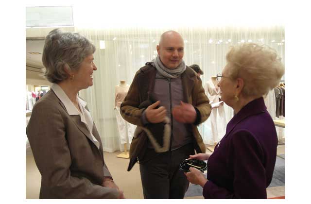 Family friend and photo maven, rock star Billy Corgan, regales Michael\'s wife, writer Valerie Lewis (left) and Dr. Lewis\'s mother Beadie Lewis of Houston, with a tale from the showbiz crypt. Naw. He\'s really inviting them to the forthcoming opening of his teashop in suburban Chicago. \r\n