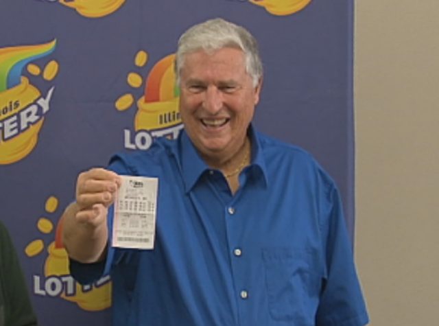 Merle Butler with his winning ticket\<br\>
