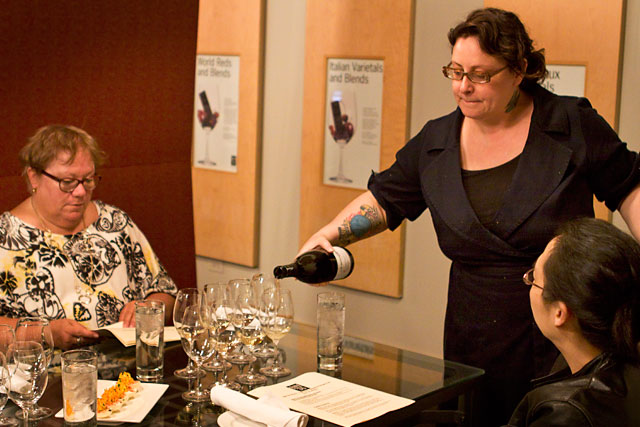 Bin\'s Jan Henrichsen pours for students at the \"Far Out Grapes\" seminar.