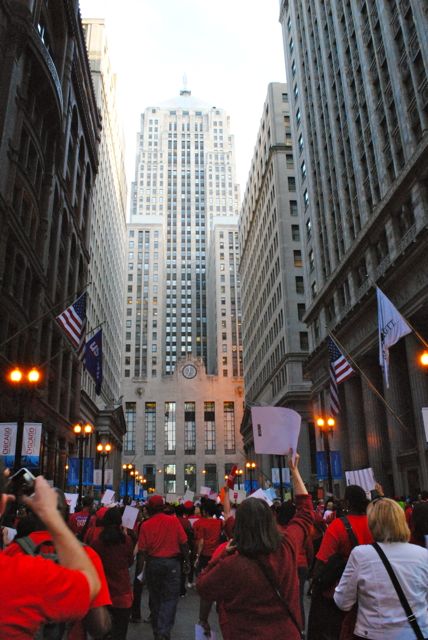 The rally moves south on LaSalle toward the Chicago Board of Trade building.