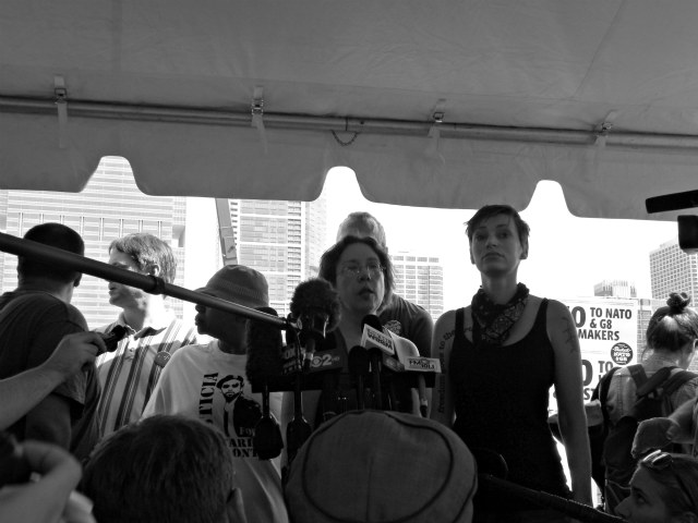 Chicago Indymedia\'s Chris Geovanis and Occupy Chicago\'s Natalie Wahlberg (right) discuss Saturday night\'s altercations between protesters and media.