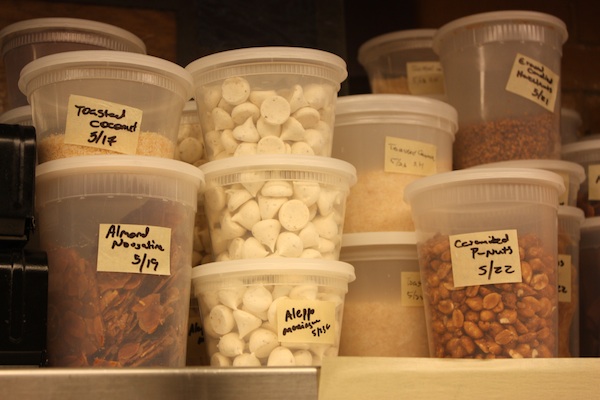 A tiny piece of Mosko\'s prep area - note the white aleppo meringues stacked and labelled.