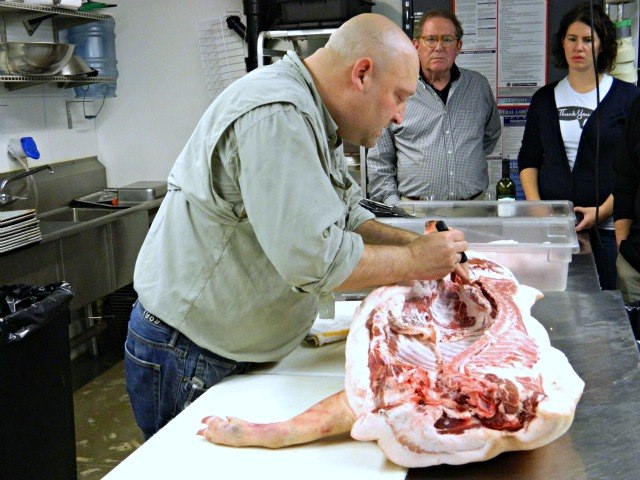 Chef Allen Sternweiler shows cuts he\'ll be making.