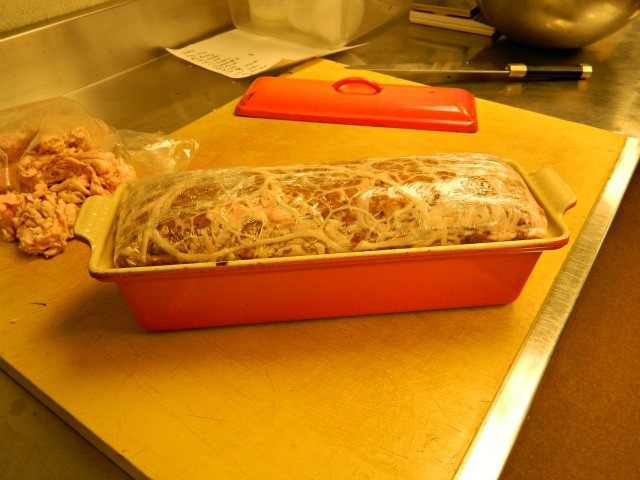 It\'s wrapped in plastic before going into the oven.