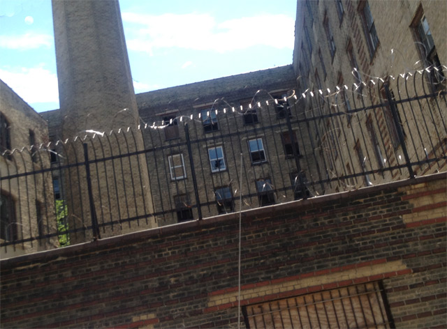 Rosenwald Apartments: northern courtyard barbed wire