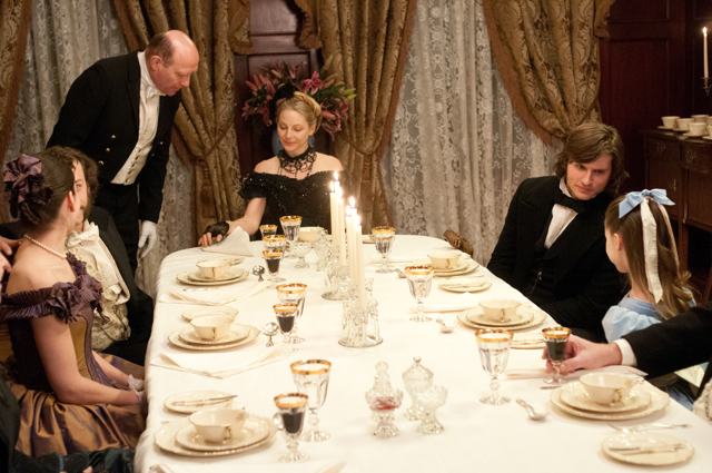 Elegant dinner dress: \<em\>Gotham: The History Of New York City to 1898\<\/em\> notes \"\<strong\>Magazine writers often depicted bankrupt businessmen as victims of their wives\' pursuit of lavish wardrobes\<\/strong\>.\"  \<br\>\<br/\>\<em\>Don\'t miss a stitch of the subterfuge: Watch \<a href=\"http://ad.doubleclick.net/click;h=v2|3F95|0|0|%2a|g;260186108;0-0;0;82485715;31-1|1;48718935|48716268|1;;;pc=[TPAS_ID]%3fhttp://www.bbcamerica.com/copper?utm_source=Gothamist&utm_medium=banner&utm_campaign=copper\" rel=\"nofollow\" onClick=\"_gaq.push([\'_trackPageview\', \'/outgoing/Copper_fashion\'])\"\>BBC America\'s\<b\> COPPER\<\/b\>\<\/a\> when it premieres on Sunday, August 19th, at 10/c.  Only from Academy AwardÂ®-winner Barry Levinson and EmmyÂ® Award-winner Tom Fontana and only on BBC America.\<\/em\>\<br\>\<br\>\r\n\r\n\<iframe width=\"640\" height=\"360\" src=\"http://www.youtube.com/embed/5C1WfSzOpm8\" frameborder=\"0\" allowfullscreen\>\<\/iframe\>\<\/i\>\<img src=\"http://secure-us.imrworldwide.com/cgi-bin/m?ci=ade2011-ca&at=view&rt=banner&st=image&ca=copper&cr=site&pc=watcheffect&ce=siteservedtag&rnd=[timestamp]\" /\>