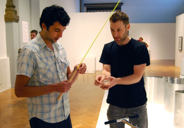Baiting the hook, alongside artist Jim Zimpel