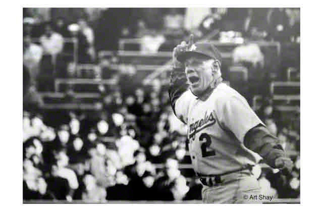 I had navigated a flight to the Pacific transporting a life-long god- baseball player and manager-Leo Durocher. This SI shot of mine showing Leo cavorting on the sidelines as an LA manager ended up in the National Portrait Gallery in DC.\r\n