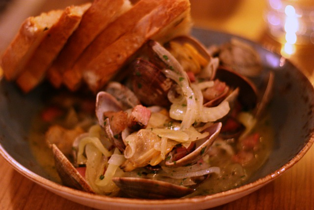 South Caroline clam boil with ham, vidalia onions, fennel, hard cider and tarragon butter.