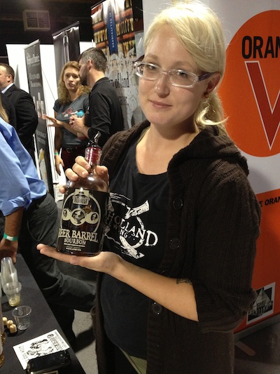 New Holland Representative Melissa Modlinski holds a bottle of their new Beer Barrel Bourbon