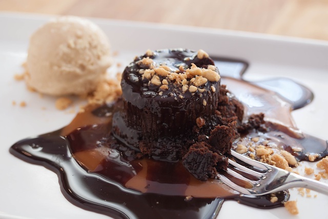 Sable: Dark Chocolate Souffle Cake with Peanut butter sauce and salted caramel ice cream.