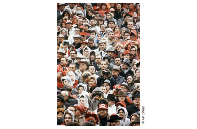 At an Arkansas-Texas football game in 1969, Nixon stands out like an easly findable Walso amidst a covey of well-hatted Texas millionaires from a plain seat in the 8th row. \r\n