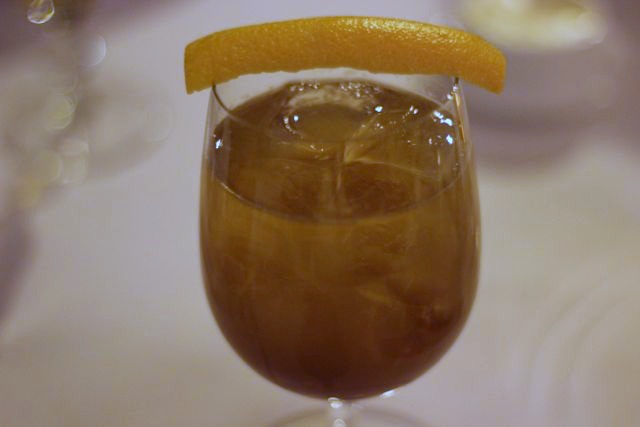 The Fountain of Clout Cocktail (Martin Miller\'s Gin, Fernet Branca, Lemon, and Soda) was paired with the second course.