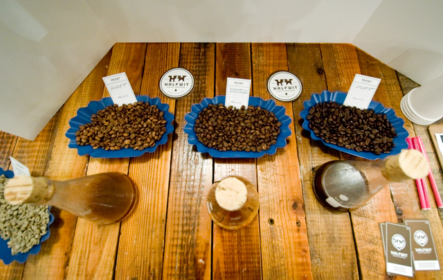 Coffee beans roasted three ways: the left are under-roasted, while the right are over-roasted.