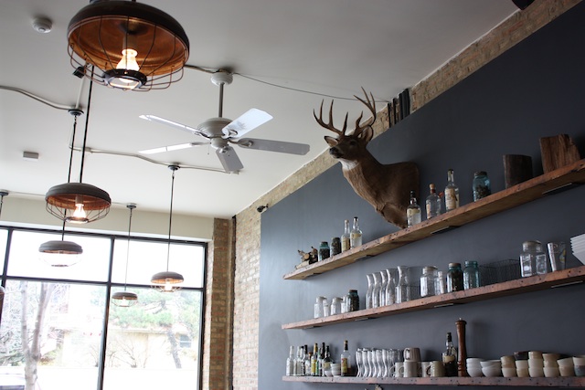 The deer head above the back bar.