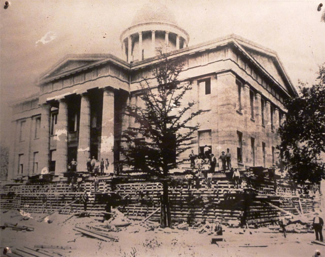 Raising the Old State Capitol in 1899.